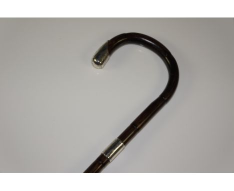 A silver mounted Victorian Malacca walking stick with foliate engraved terminal and collar, vacant oval cartouche, 92 cm long