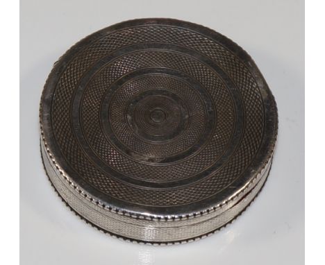 A Continental .935 Standard engine turned circular compact the lid with concentric circular bands the base with horizontal ba