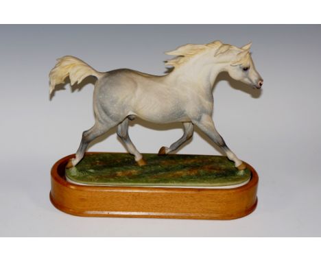 A Royal Worcester model of an Arab Stallion modelled by Doris Lindner, " Indian Magic", 29 cm wide, 23 cm high overall, print