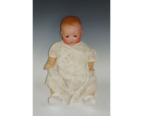 An Armand Marseille "My Dream Baby" German boy doll, mold number 351/7 ½ k bisque head with open mouth and flip back eyes, Ci