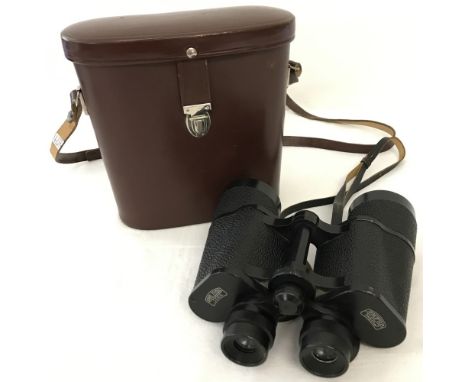 A pair of vintage leather cased Carl Zeiss Jena binoculars. Jenoptem, 7 x 50w. Complete with strap. 