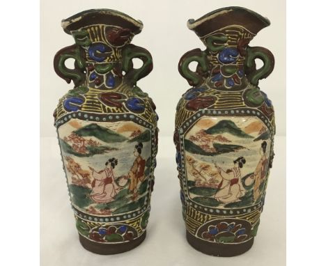 A pair of Japanese ceramic vases.  Approx. 17cm tall.