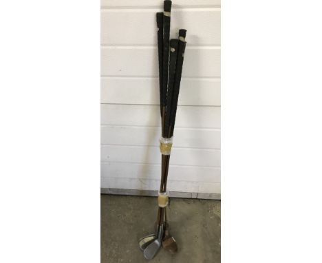 A collection of 6 vintage E.R.Whitcombe golf clubs.  