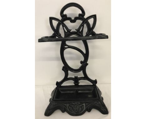 A reproduction cast iron umbrella/stick stand with Art Nouveau style decoration.  Approx. 57cm tall.