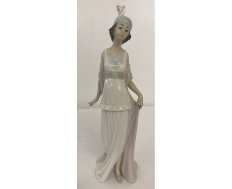 Retired Lladro ceramic figurine " Talk of the Town" # 5788. In original box. Approx. 26cm tall.