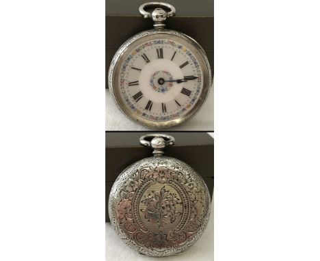 A vintage hallmarked silver ladies pocket watch with floral etched decoration to case and painted flower detail to enamel fac