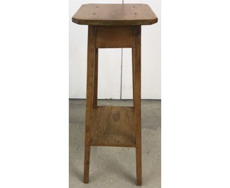 A vintage light wood plant stand.  Approx. 77.5cm tall.