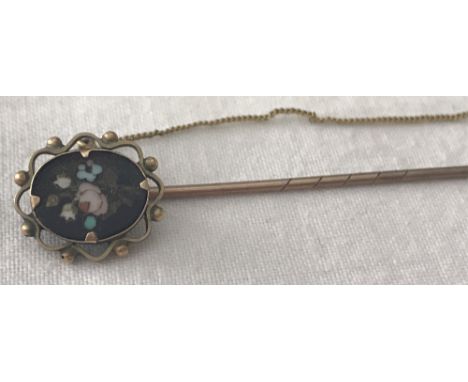 A Victorian Pietra Dura stick pin brooch depicting a floral spray. Tests as 14k gold. With safety chain. 