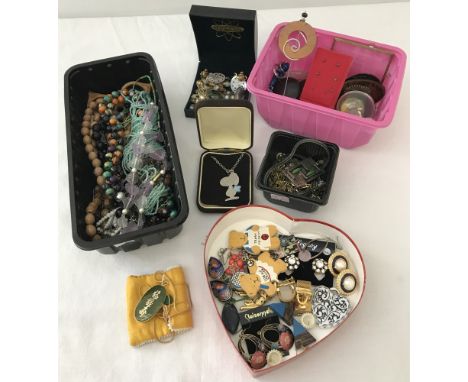 4 tubs of vintage costume jewellery, necklaces, earrings and other items. To include natural shell, semi precious stones and 