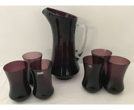 A vintage aubergine coloured Polish glass pitcher and 6 matching goblets by Krosno.  