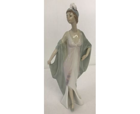 Retired Lladro ceramic figurine "Sophisticated" #5787. In original box. Approx. 26cm tall.