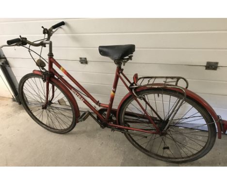 A ladies vintage 3 gear Mistral bicycle in red metallic paint finish. Complete with bell. 