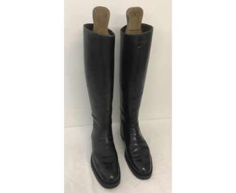 A pair of men's vintage leather riding / Jack boots with wooden trees.  Shoe size approx 10.