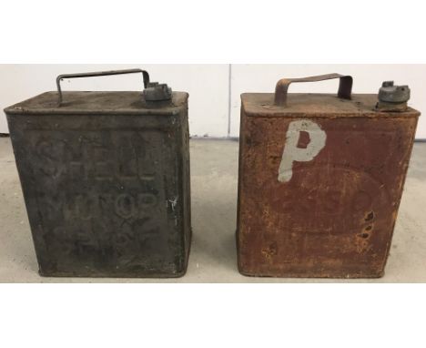 2 vintage 2 gallon petrol cans. A Shell can together with an Esso can. With original caps. 