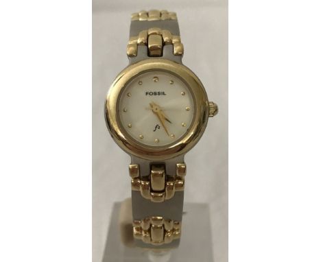 A ladies Fossil F2 watch in working order. With two colour stainless steel strap. Not in original box. 