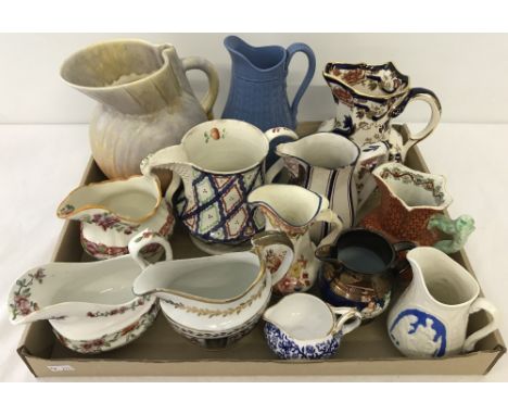 A collection of vintage & antique ceramic jugs. To include Masons. 
