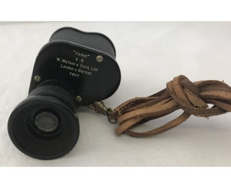 A vintage W. Watson & Sons, Ltd "Vedet" monocular. On brown leather strap. 