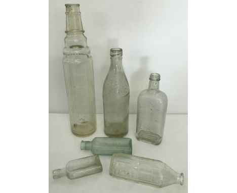 A small collection of vintage glass bottles. To include large Essolube oil bottle and Oxygas bottle. 