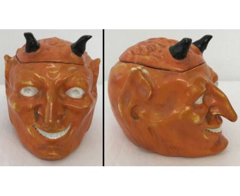 A Carlsbad Austria, ceramic humidor of a devils head. Some damage to lid. 