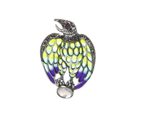 PLIQUE-A-JOUR EAGLE BROOCH, with a round ruby eye, green and purple enamelled wings bordered by marcasites, perched upon a ca