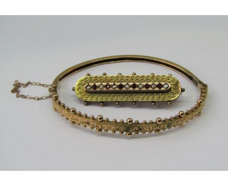 Victorian 9ct hinged bangle with beaded edges, together with a similar style brooch set with garnets and seed pearls, 9g tota