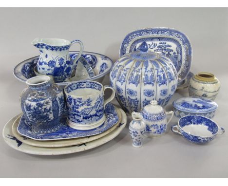 A collection of 19th century and later blue and white wares including an early 19th century tankard with landscape and deer d