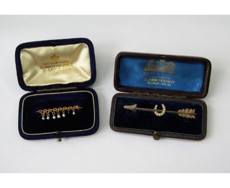 14ct pearl fringe brooch (one drop vacant) and a further white metal arrow bar brooch with horseshoe motif set with seed pear