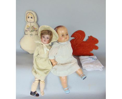 Antique porcelain headed doll with articulated wooden limbs, inscribed 390AOM to the back of the neck, shutting eyes and open