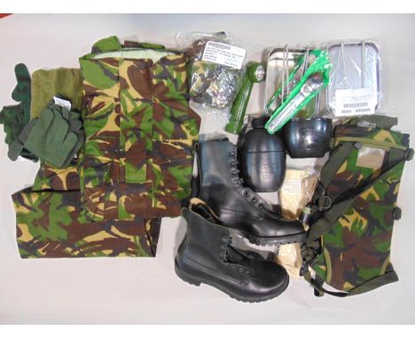 Military rucksack 2004 containing army clothing including combat wet weather jacket and trousers, size 8 boots, water bottle,