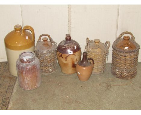 A small collection of stoneware jars and flagons to include a 19th century salt glazed example with merchants mark Watts &amp