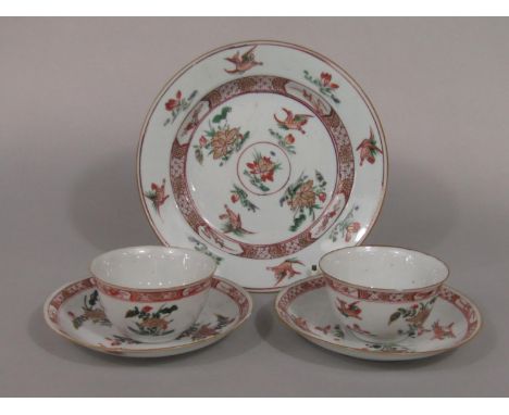 A collection of oriental famille verte tea wares, possibly Kong Shi, comprising a pair of tea bowls, a pair of saucers and a 