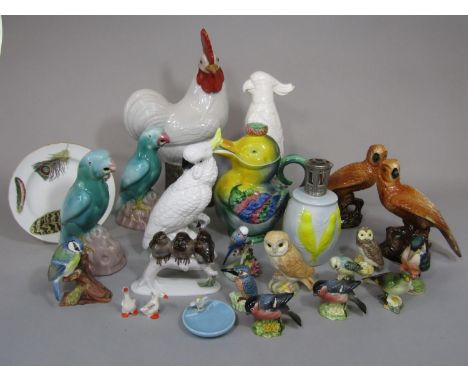 A collection of bird related ceramics including a Crown Staffordshire model of a Cockatoo by J G Jones, a German group of fle