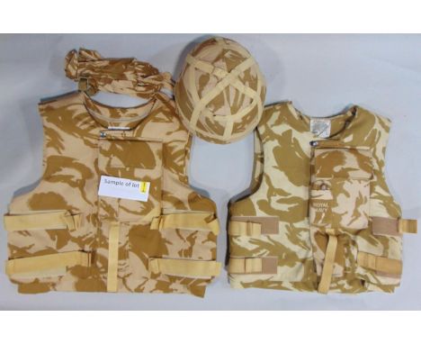 Desert Storm NATO military clothing including 2 body armour jackets, combat jacket, shorts, helmet and gloves, in a holdall. 