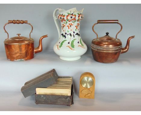 A mixed lot comprising two copper kettle, an oak cased barometer, a book containing stereoscope slides of South Africa 1900-1