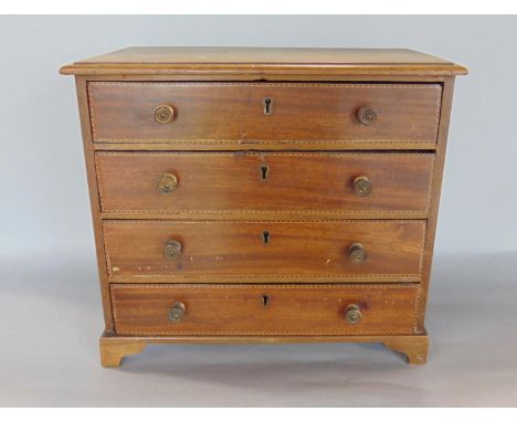 Turn of the century mahogany and parquetry crossbanded apprentice chest comprising three long drawers upon bracket feet, 31cm