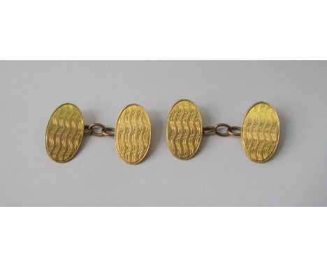Pair of 15ct engine turned cufflinks, 6.3g total (2) 