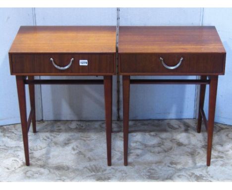 A pair of Meredew retro teak bedside lamp tables, each fitted with a frieze drawer, with drop handle, raised on slender squar