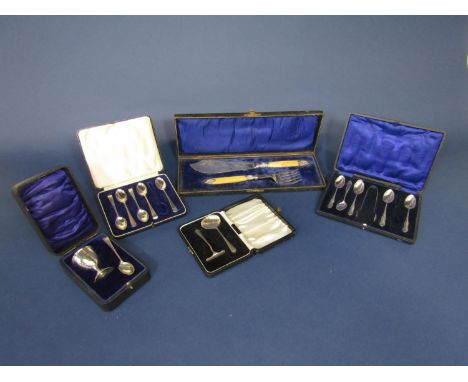 A collection of cased part sets of silver comprising cased part set of five teaspoons and sugar tongs, cased spoon and feeder