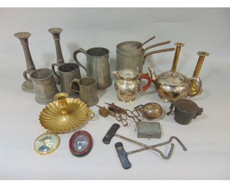 Bow of mainly pewter to include quart tankard, graduated pans, candlesticks etc, with other metalwares and a ceramic teapot (