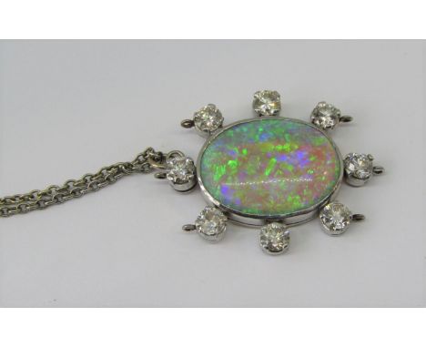 Fine opal and diamond pendant in white metal, with screw fitting to reverse and attached 9ct white gold chain, opal measuring