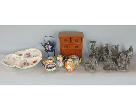 A mixed lot comprising an apprentice piece miniature mahogany chest of drawers, a collection of pewter figures, five enamel t