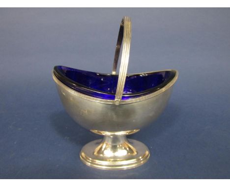 Georgian style silver sugar basket with articulated handle and cast banded rim, maker S J R, assay marks rubbed, original blu