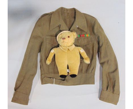 WW2 woollen army jacket with ribbon bar together with a vintage Merrythought teddy bear with golden velvet body in the style 