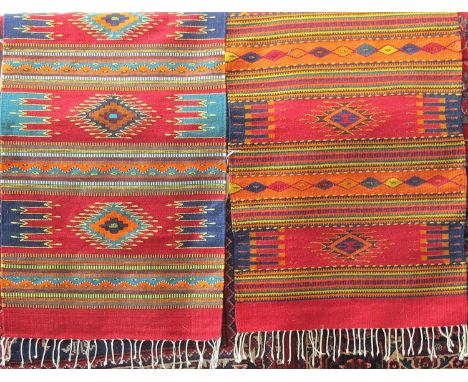 A matched pair of Inca type Kelim rugs, with striped colourful decoration, each 80 x 150cm (2) 