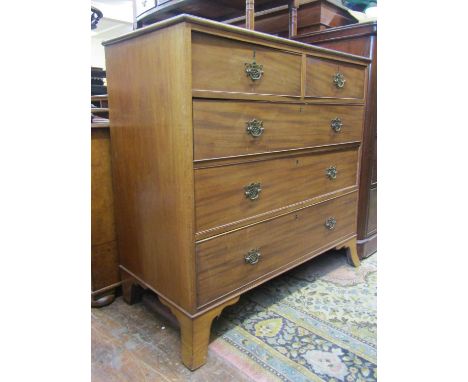 An early 19th century mahogany bedroom chest of two short over three long graduated drawers with splay bracket supports, 112 