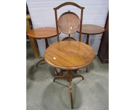 Three similar contemporary teak shaker style occasional tables of circular form raised on arched tripod supports together wit