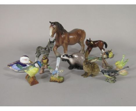 A collection of ceramic animals and birds including a Royal Doulton badger number 2666, a Hutschenreuther rabbit, a Royal Cro