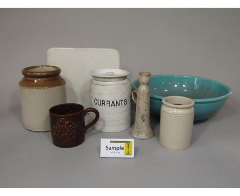 A collection of kitchen related ceramics including a cream glazed ceramic slab, 25cm approx, a cream glazed jar marked 'Curra