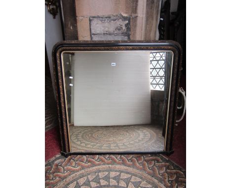 A Victorian overmantle mirror, the moulded frame with repeating foliate detail, rounded top corners and raised on ceramic bun