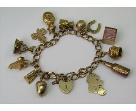 9ct curb link charm bracelet with heart padlock clasp, hung with thirteen novelty charms to include a hinged genie lamp, acor